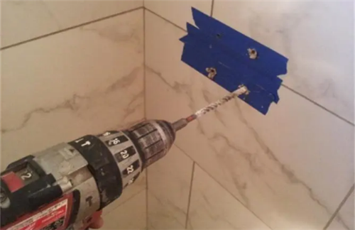 瓷砖墙上打孔(瓷砖墙上打孔最简单方法)